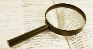 A looking glass resting on a book